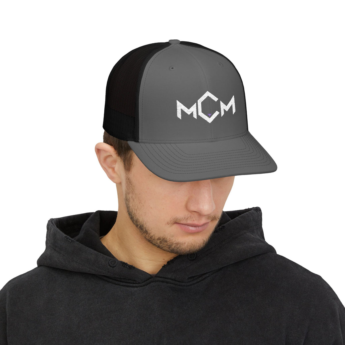 MCM Trucker Cap in charcoal / black, worn, front view
