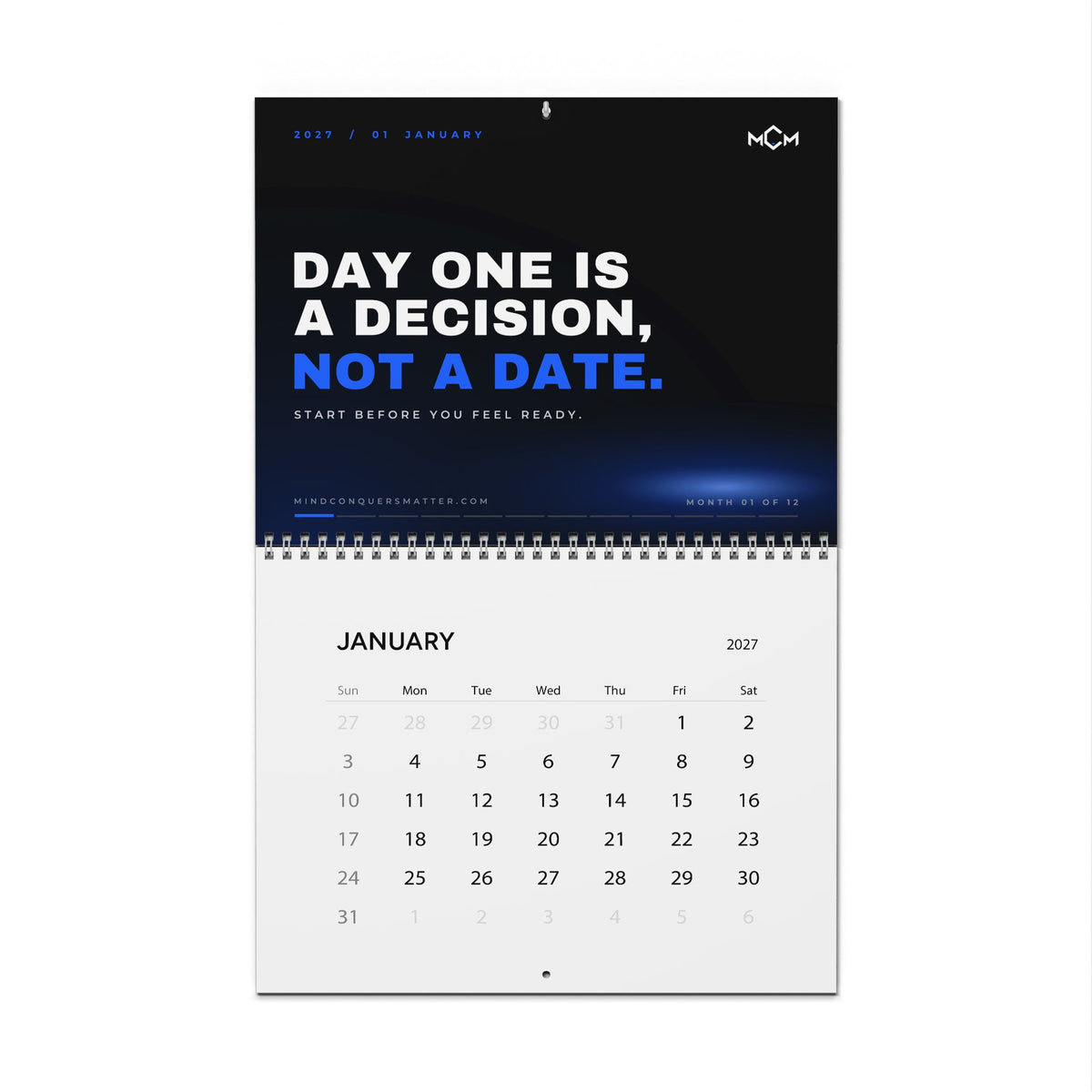 MCM 2027 Discipline Calendar hanging open at January: Day one is a decision, not a date.