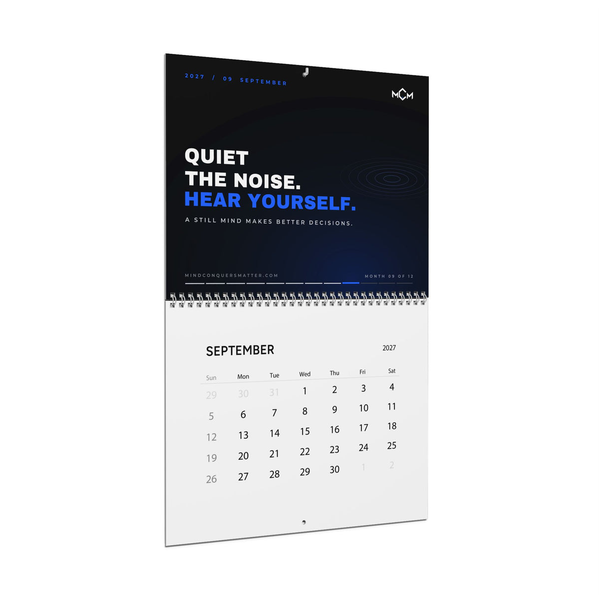 MCM 2027 Discipline Calendar hanging open at September: Quiet the noise. Hear yourself.